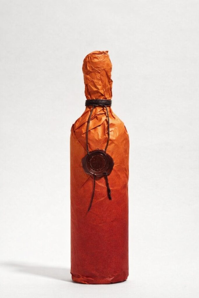 Packaging premium ceralacca — vino d'autore, olio biologico, edizioni numerate.