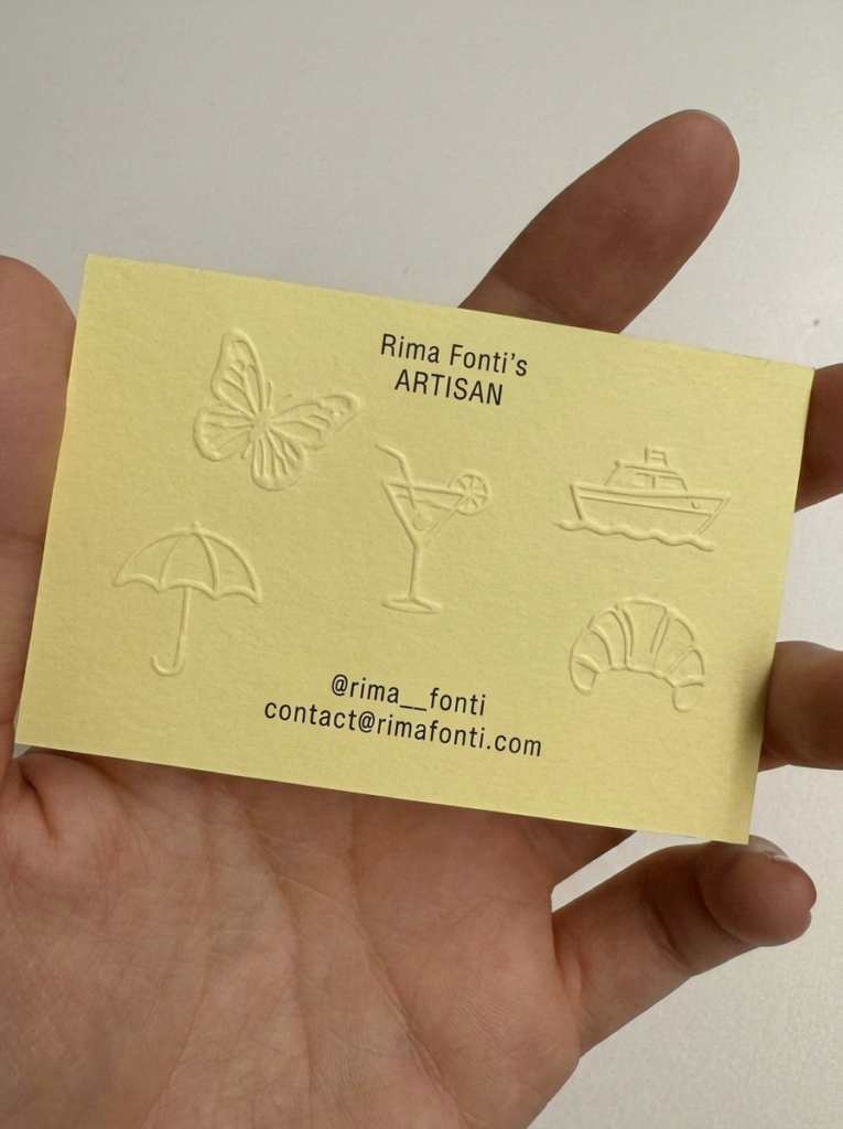 Dry-embossed pictograms on paper — business cards, signature postcards, tactile branding.